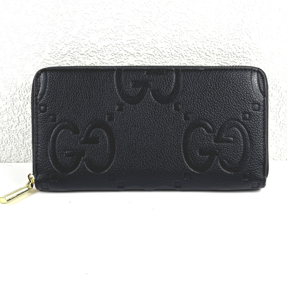 Gucci Zip Around Wallet Unisex OS Black GG Embossed Leather